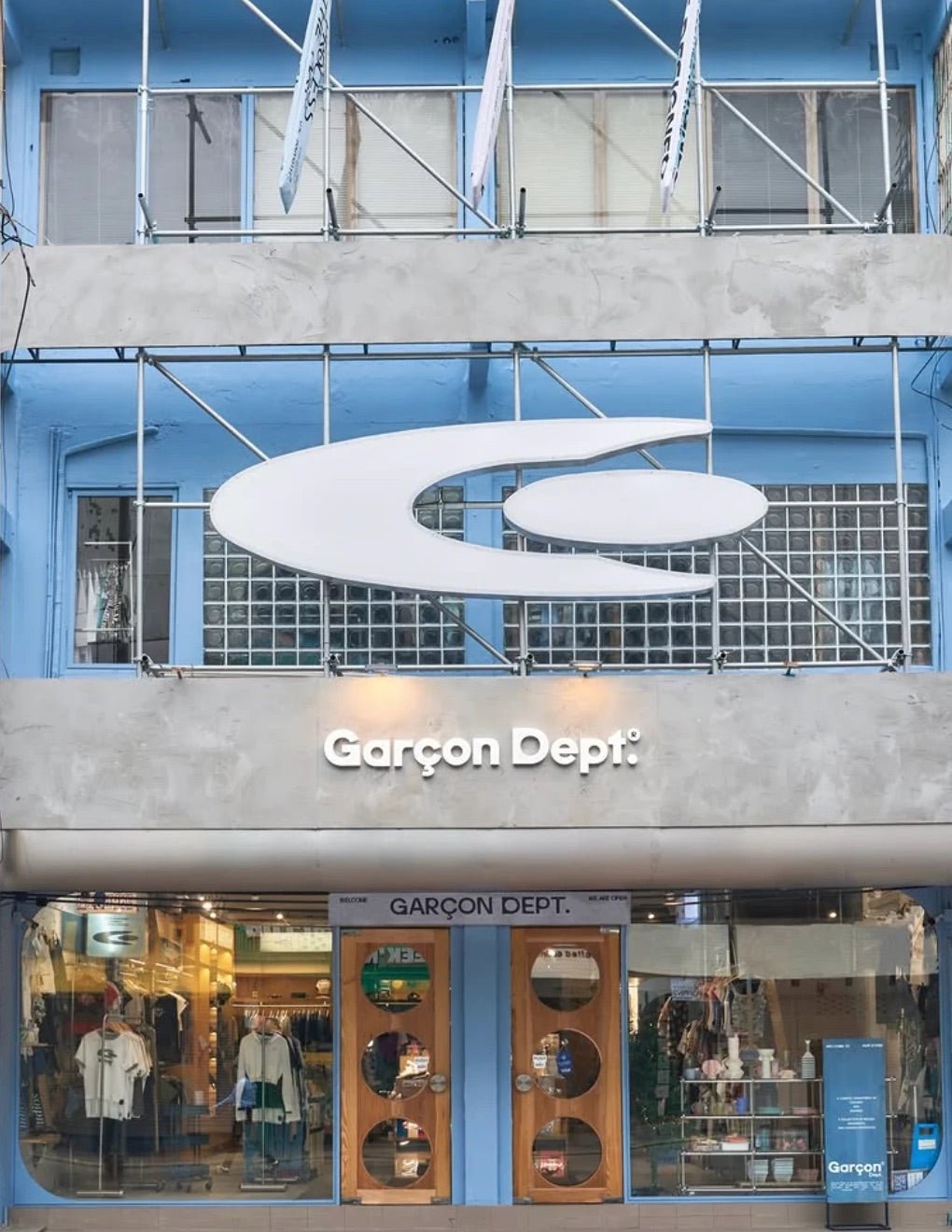 Garçon Dept. Siam Square storefront with a painted blue facade and the large white logo sign