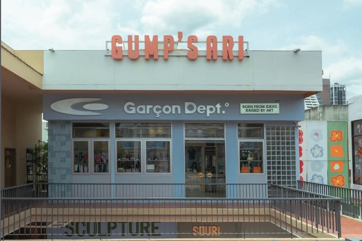 Garçon Dept. Ari storefront at GUMP's Ari with blue facade and logo